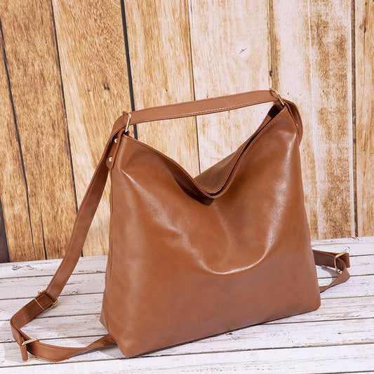 BrownFaux leather crossbody bag backpack